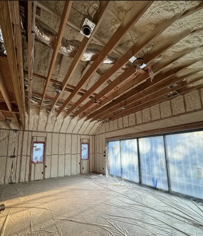 Interior walls and ceiling insulated with spray foam during new construction in Baker City